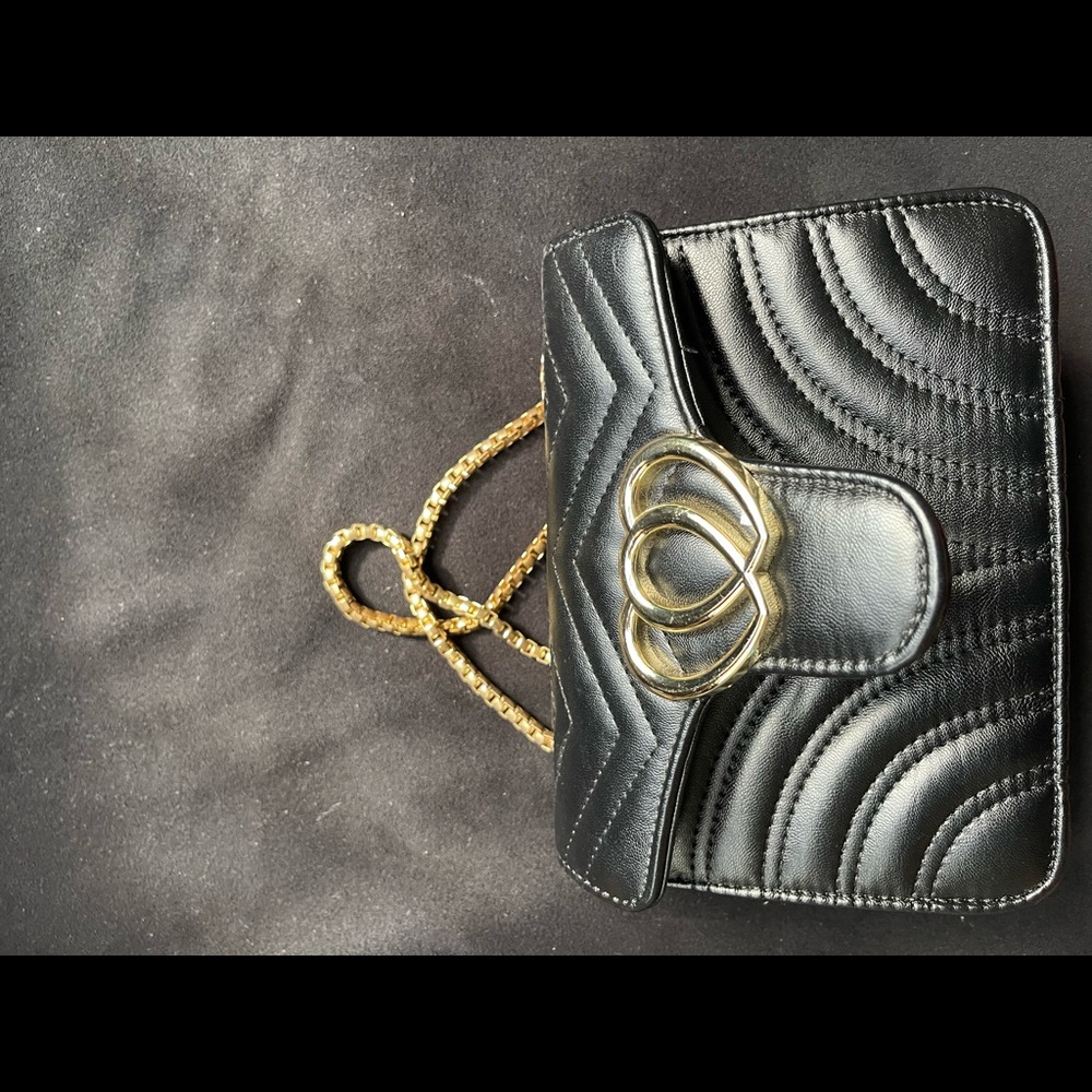 Small black handbag with heart